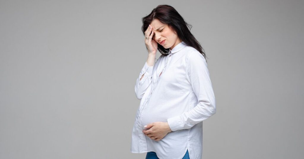 Pregnant woman experiencing dizziness in early pregnancy consulting a gynecologist in Indore for proper evaluation and care